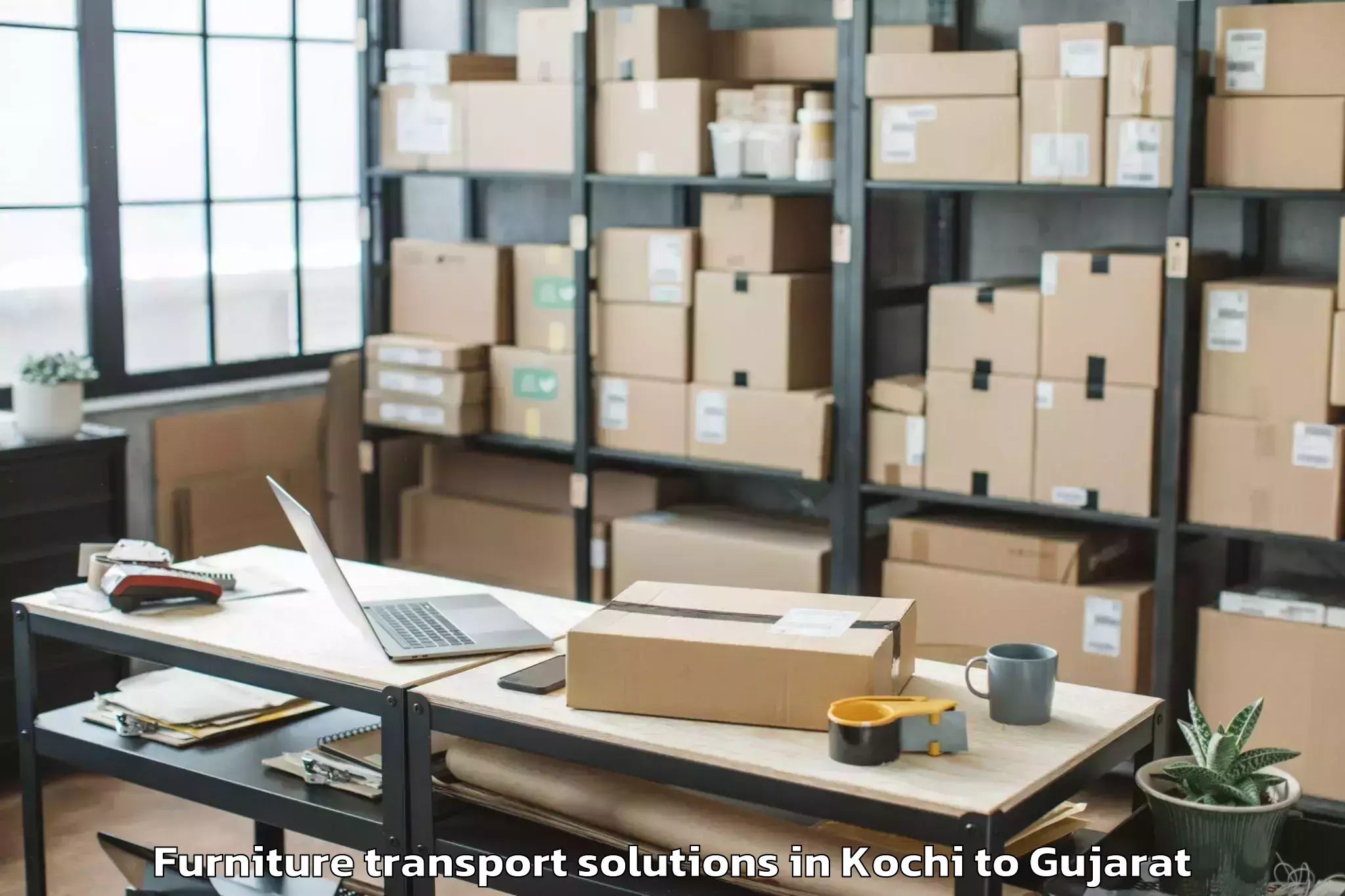 Professional Kochi to Jafrabad Furniture Transport Solutions